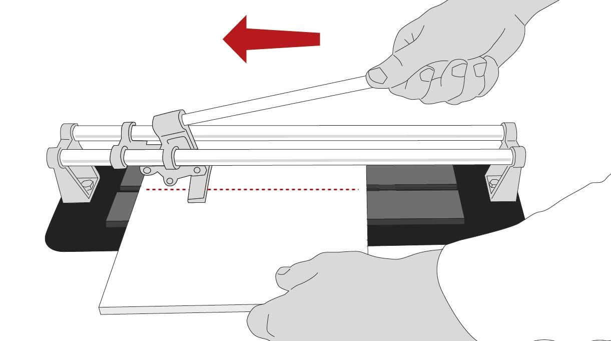 una persona usando una cortadora de cerámicas manual