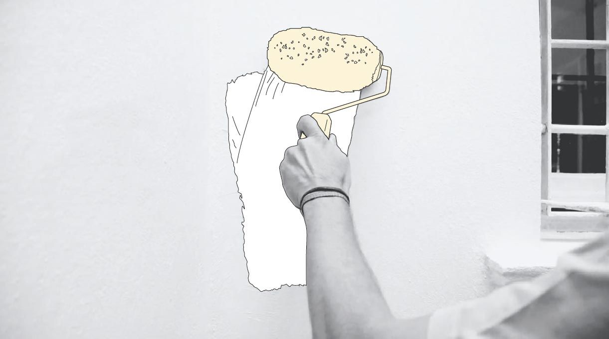 pintando el muro con rodillo