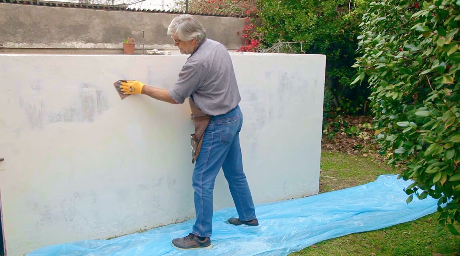 Lijado manual de pared exterior