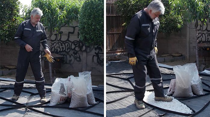 Una persona con 4 sacos de piedras