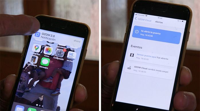 Una persona muestra cómo llega una notificación al celular al abrir la puerta con el sensor