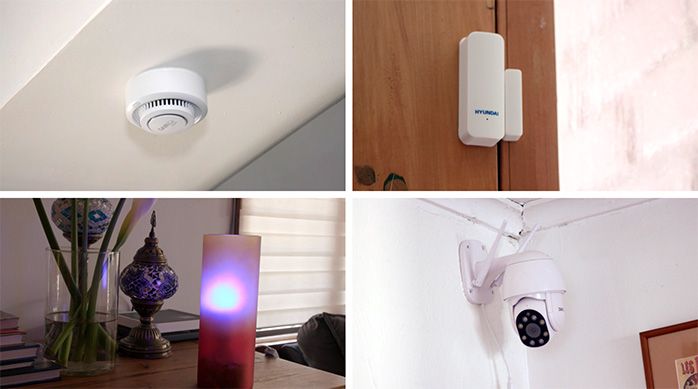Se ve un detector de humo inteligente, un sensor de puerta, una ampolleta smart y una cámara de seguridad inteligente dairu