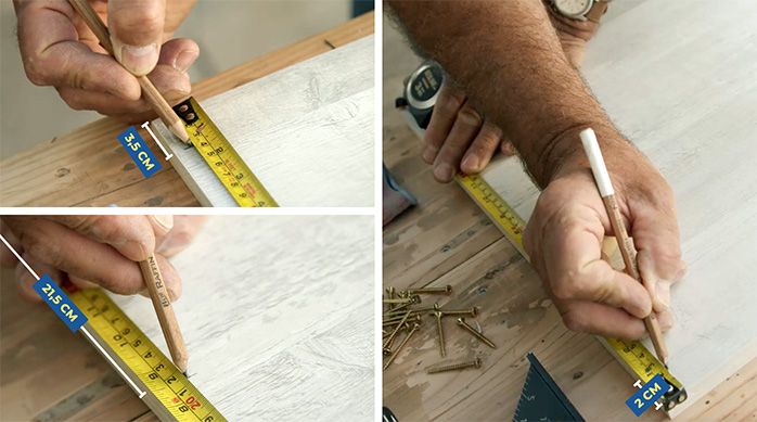 Una persona marca los lugares de las fijaciones en la melamina para construir el mueble arenero para gatos