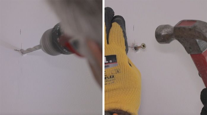 un hombre pone un tarugo clavo en la pared para fijar el mueble gamer vertical