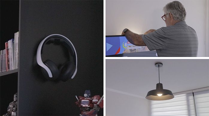 un hombre pone accesorios gamer y artículos geek en el mueble gamer