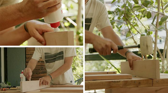 un hombre une con tarugos los trozos de madera