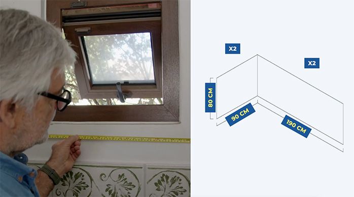 un hombre mide el ancho de la pared de un baño de visitas