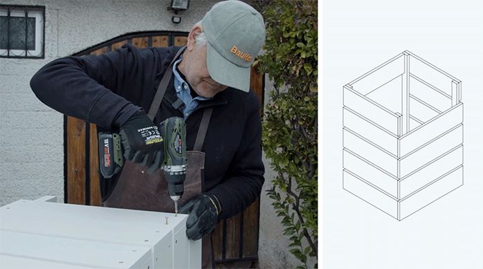 un hombre fija el palillaje del frente del mueble de cocina.