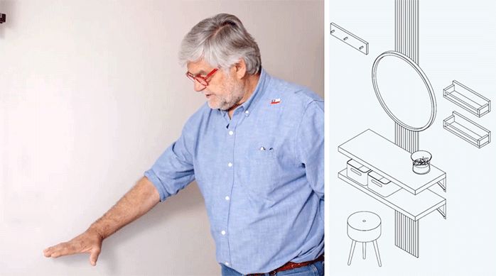 un hombre muestra la altura que tendrá la cubierta de madera del tocador, junto a una gráfica que muestra el diseño del tocador.