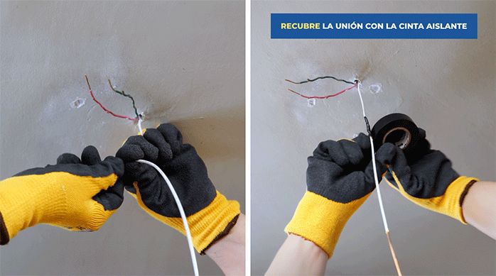 un hombre une cables para hacer la conexión eléctrica del ventilador y luego los recubre con cinta aislante.