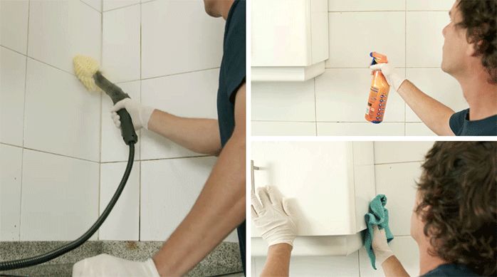 un hombre limpia las cerámicas de la cocina usando un limpiador a vapor, un producto antigrasa y un paño de microfibra.