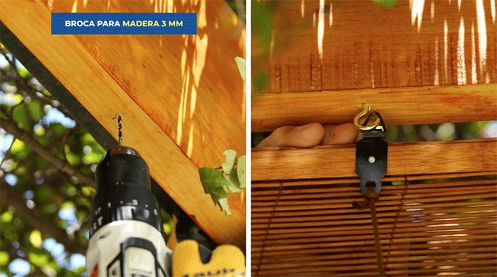 una persona perfora la viga de madera con una broca para madera de 3 mm y cuelga la primera persiana de bambú.