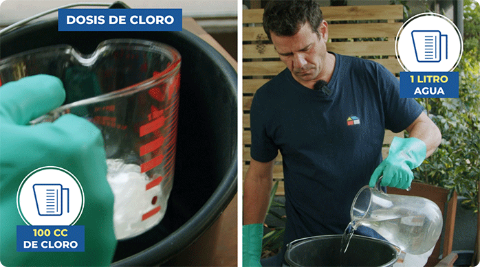 un hombre con guantes mezcla agua con cloro en un balde.