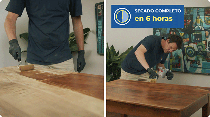 un hombre aplica barniz en la mesa de madera con un rodillo espuma y una brocha.