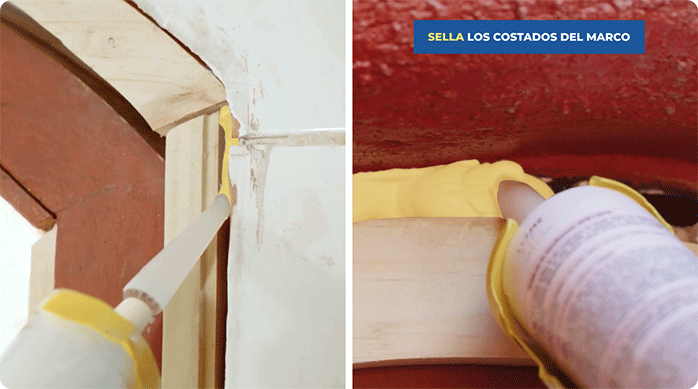 una persona sella el borde del marco de la ventana.