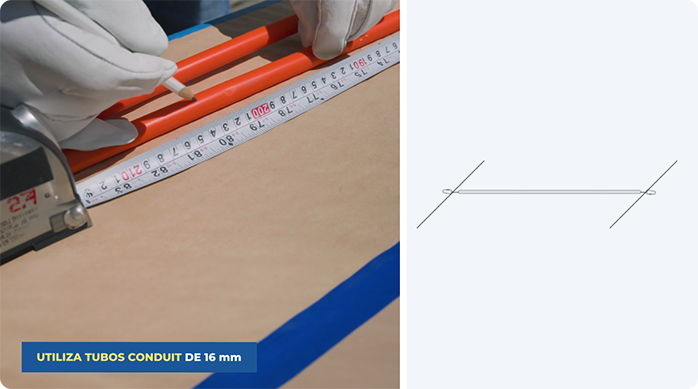 una persona marca un tubo conduit de 16 mm.