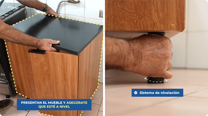 un hombre instala un mueble de cocina piso nuevo, ajustando sus patas para que quede nivelado.