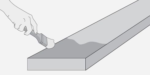 Gráfica de una brocha aplicando un protector de madera a la viga
